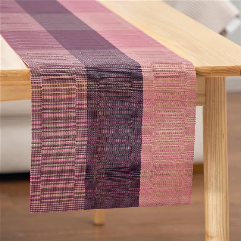 Non-slip PVC place mat in modern simple style, showing gradient bamboo black colour option on a kitchen counter.