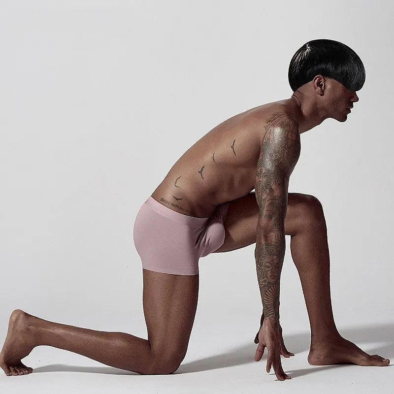 Men's seamless modal underwear in green, pink, and white with mid waist design