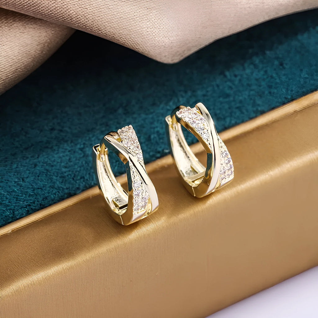 Geometric copper hoop earrings with zircon detailing in 14K yellow colour