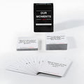 Our Time Lovers Edition communication cards in black packaging, measuring 9 by 6.5 centimetres.