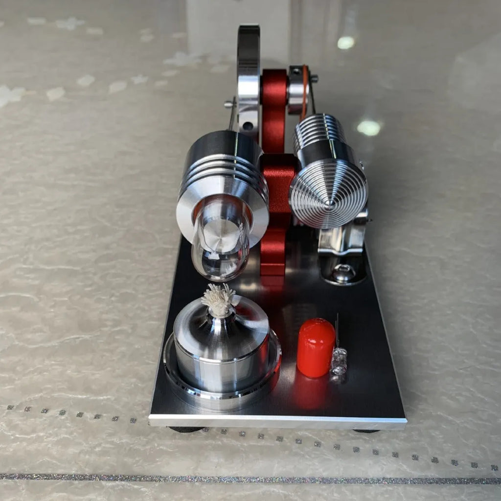 2019 Red upgrade miniature Stirling engine toy on a desk, 155x80x85mm, showing flywheel and cylinder
