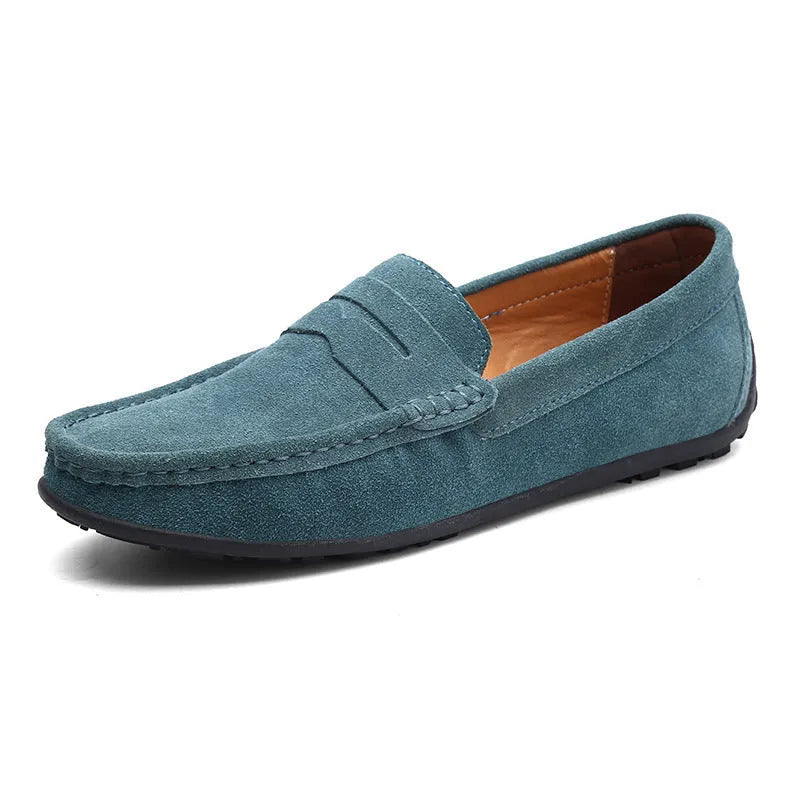 Men's suede Gommino-style loafers in a range of colours on a flat rubber sole.