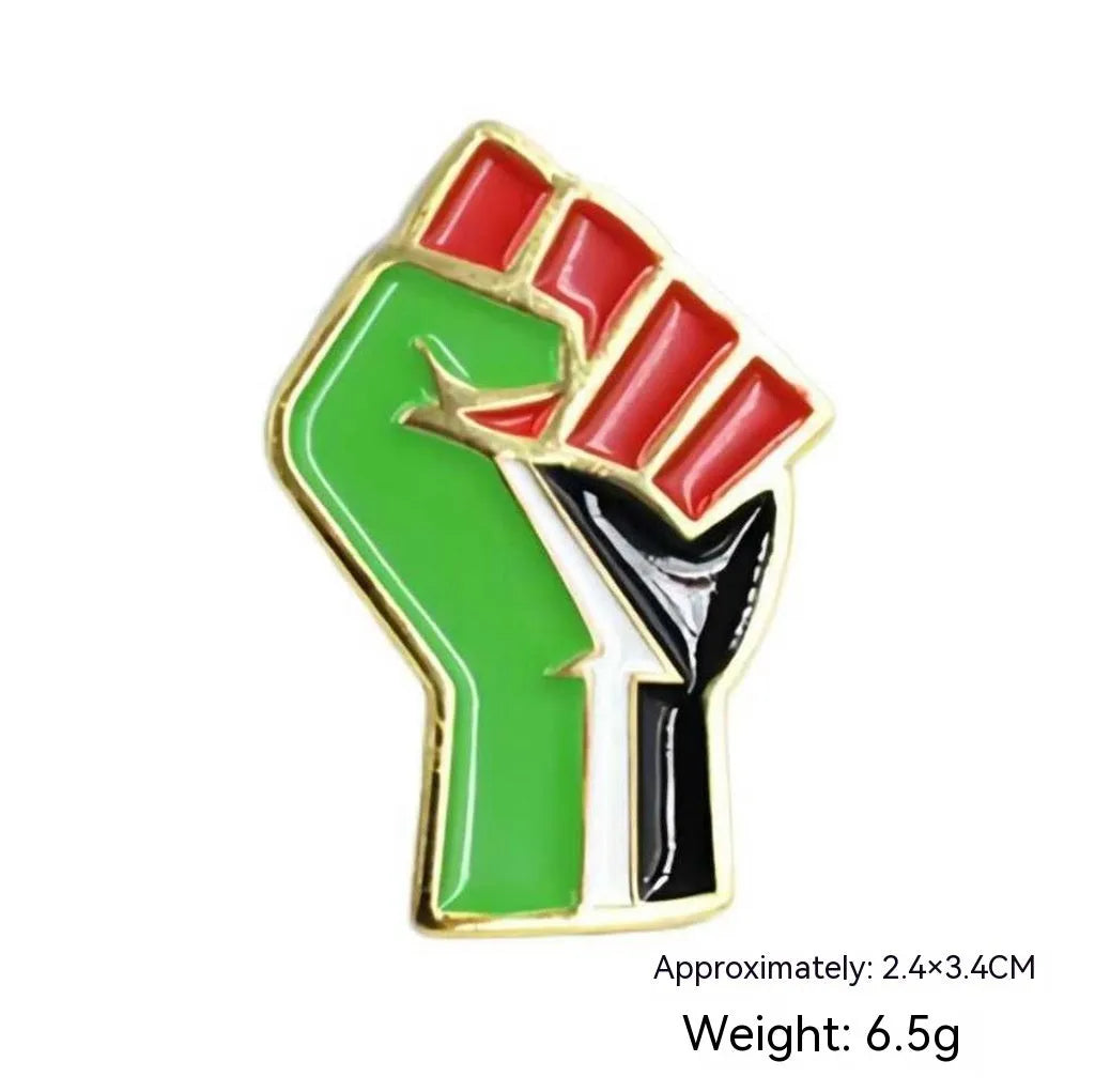 Square corrugated alloy brooch with Palestinian flag design on a neutral background