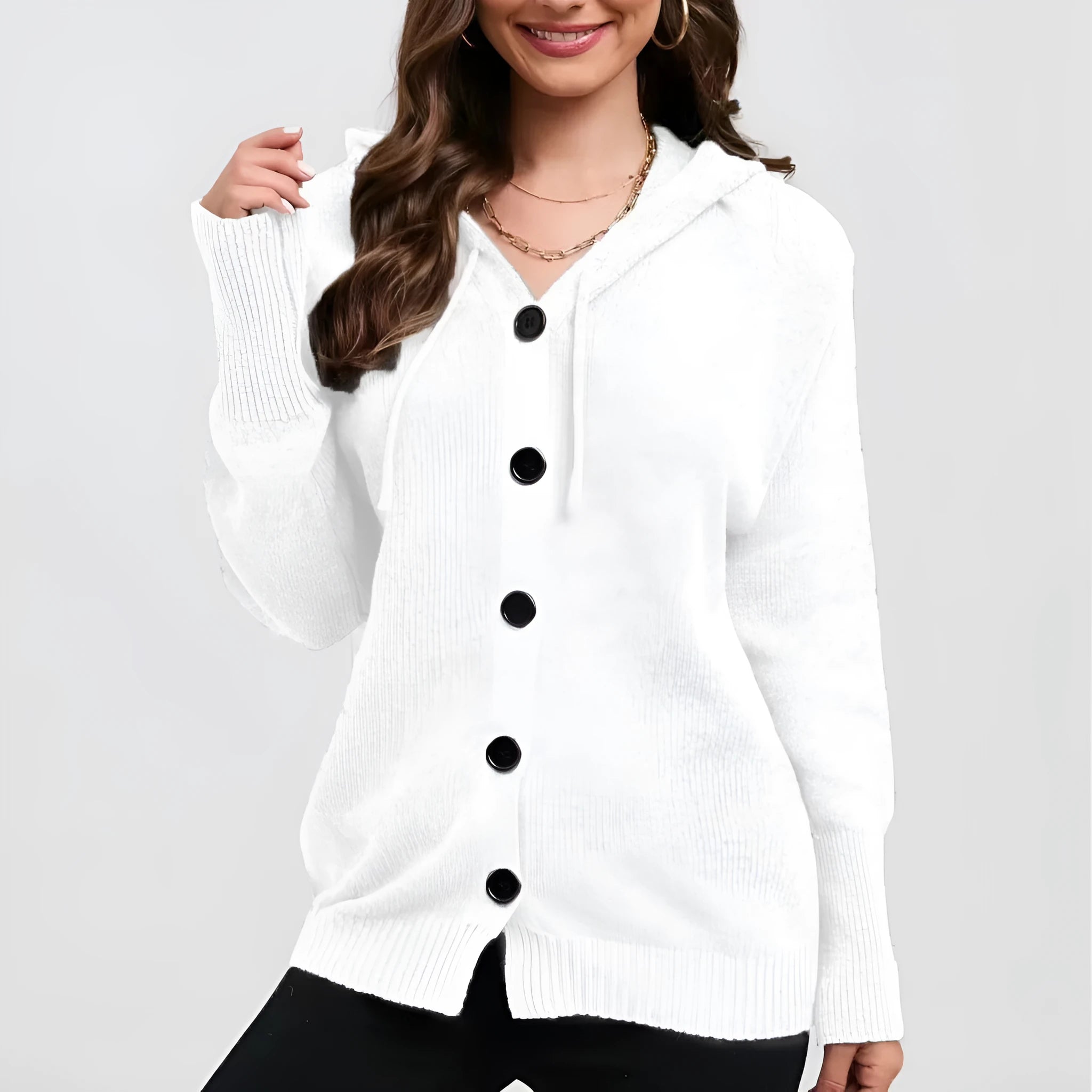 Women's solid colour hooded cotton cardigan sweater in a loose fit, shown in one of six available colours.