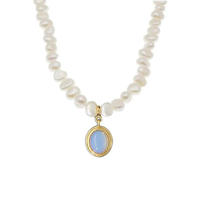 Round medal pearl necklace with geometric silver pendant and irregular freshwater pearls