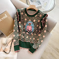 Green women's printed sweater with a loose fit and regular sleeves for casual commuting wear.