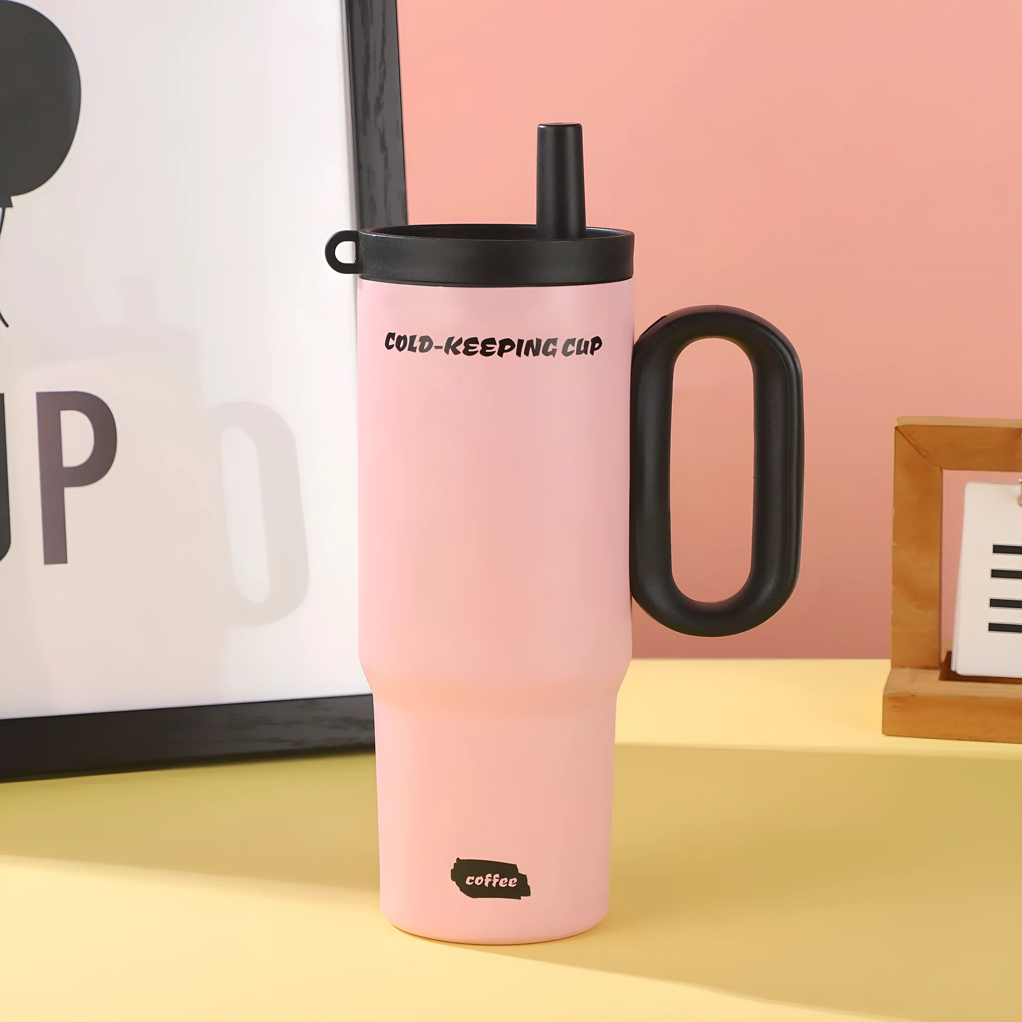 Large capacity insulated straw cup with handle in choice of five colours showing vacuum insulation technology