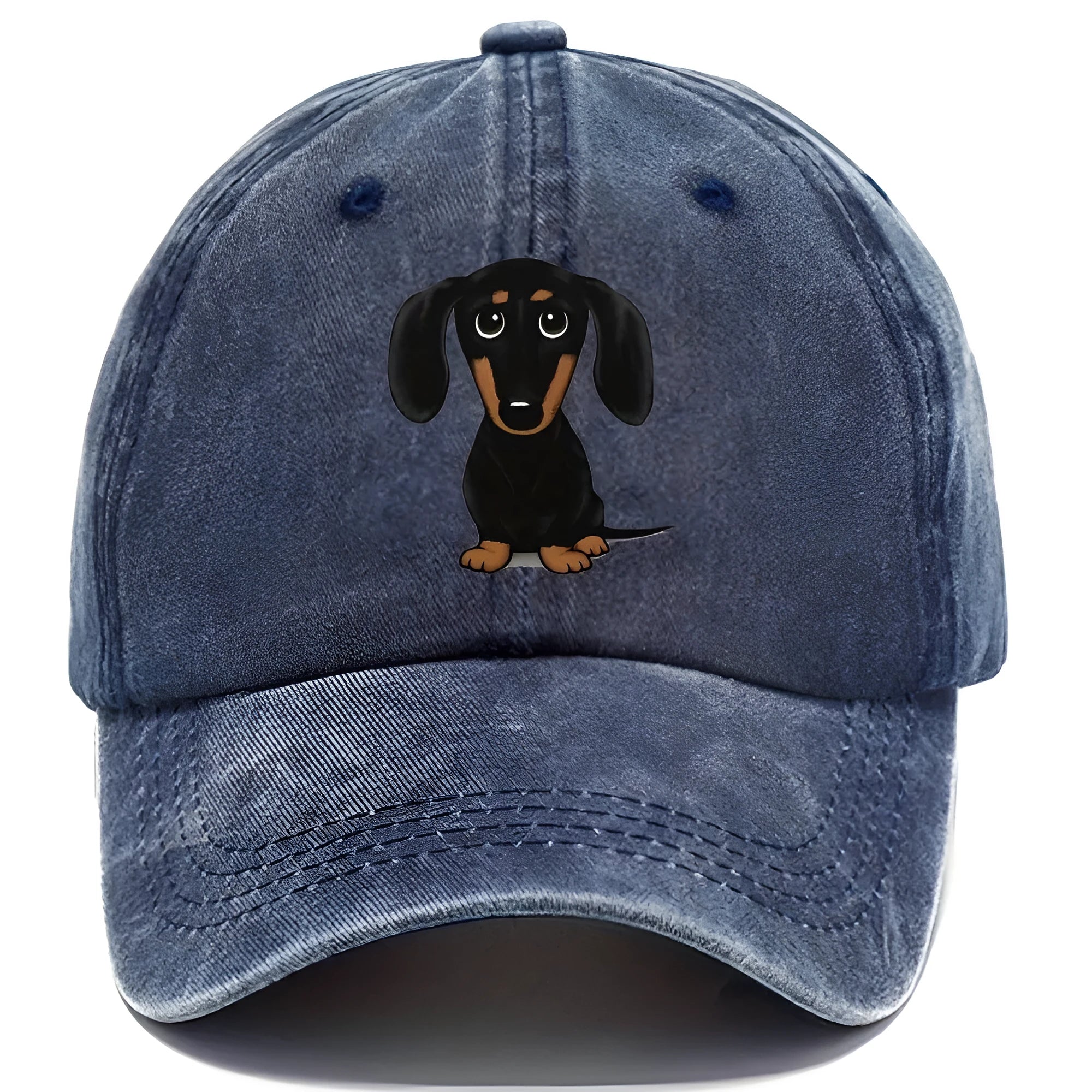 Retro washed blue cotton baseball cap with a printed dachshund design on the front and a peaked brim.
