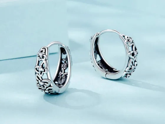 Retro hollow butterfly zircon earrings in sterling silver with 14mm height and 5mm width dimensions