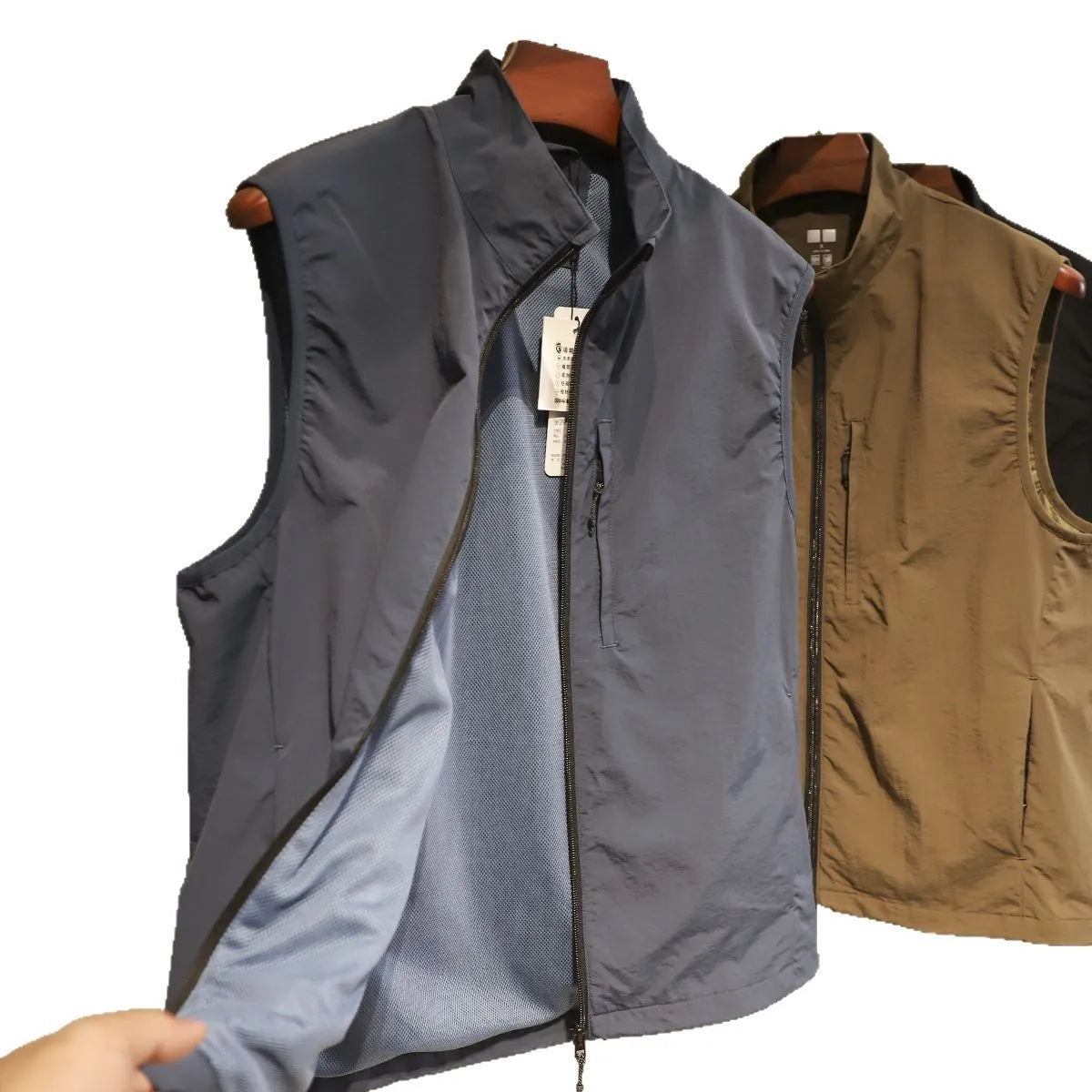 Men's thin nylon vest in straight cut with side pockets, shown in Army Green colour.