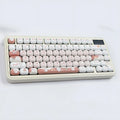 Dessert Cat MOG round cartoon key cap set for mechanical keyboards on a white background.