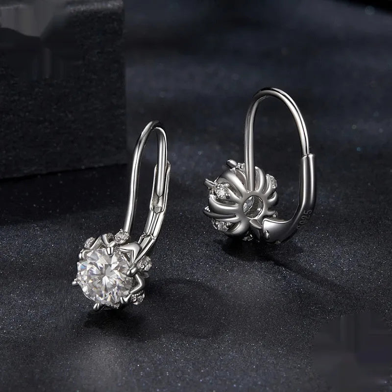 White gold plated sterling silver flower bud clip earrings with moissanite stone