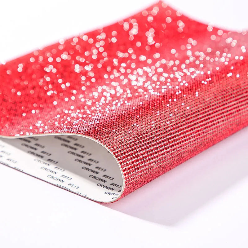Rhinestone adhesive sheet with eight-eye pattern in multiple colour options on white background