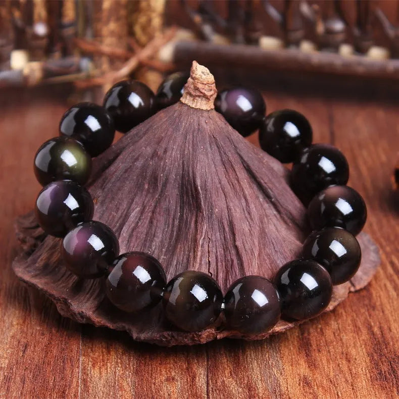 Natural crystal Pi Xiu bracelet with icy obsidian beads in geometric ethnic design