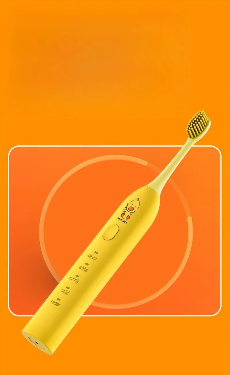 Small yellow duck design electric toothbrush with soft bristles and USB charging port