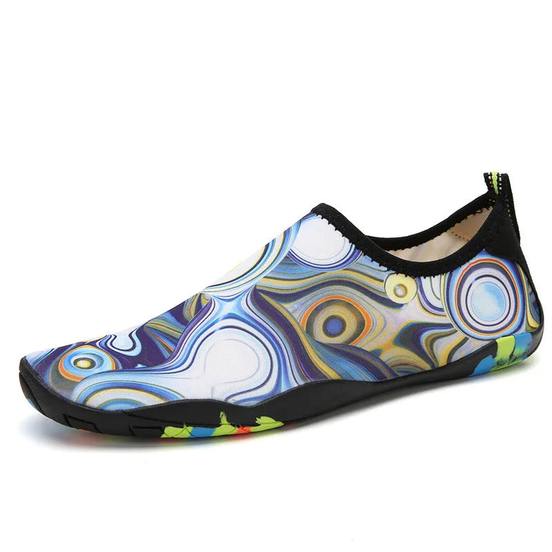 Beach wading shoes with stretch Lycra uppers and EVA midsoles in blue, black, pink, purple, and camouflage colours