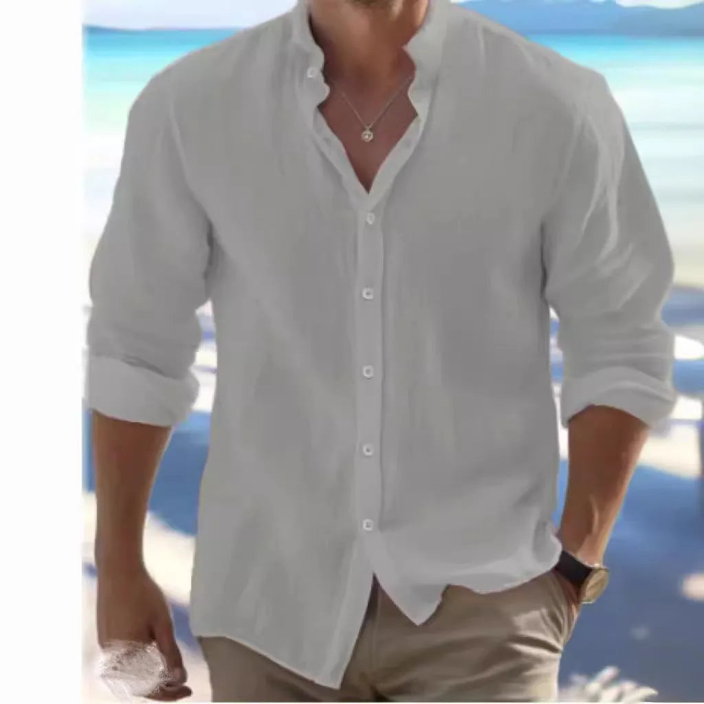 A man's light grey casual pullover shirt made from long-staple cotton fabric, shown on a hanger.