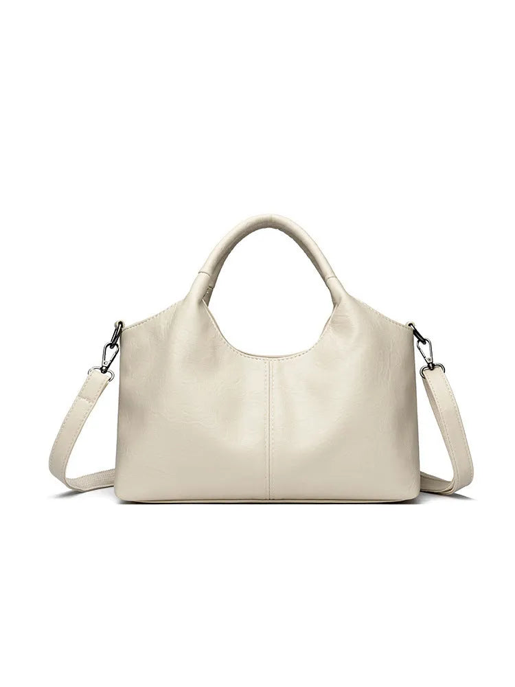 Genuine leather women's cross-body bag in black with soft texture and large capacity design