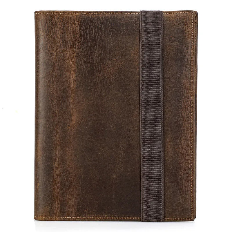 Brown Crazy Horse leather protective sleeve for an A5 notebook, showing square shape and multi-pocket design.