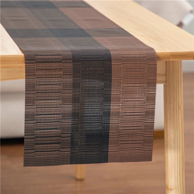 Non-slip PVC place mat in modern simple style, showing gradient bamboo black colour option on a kitchen counter.