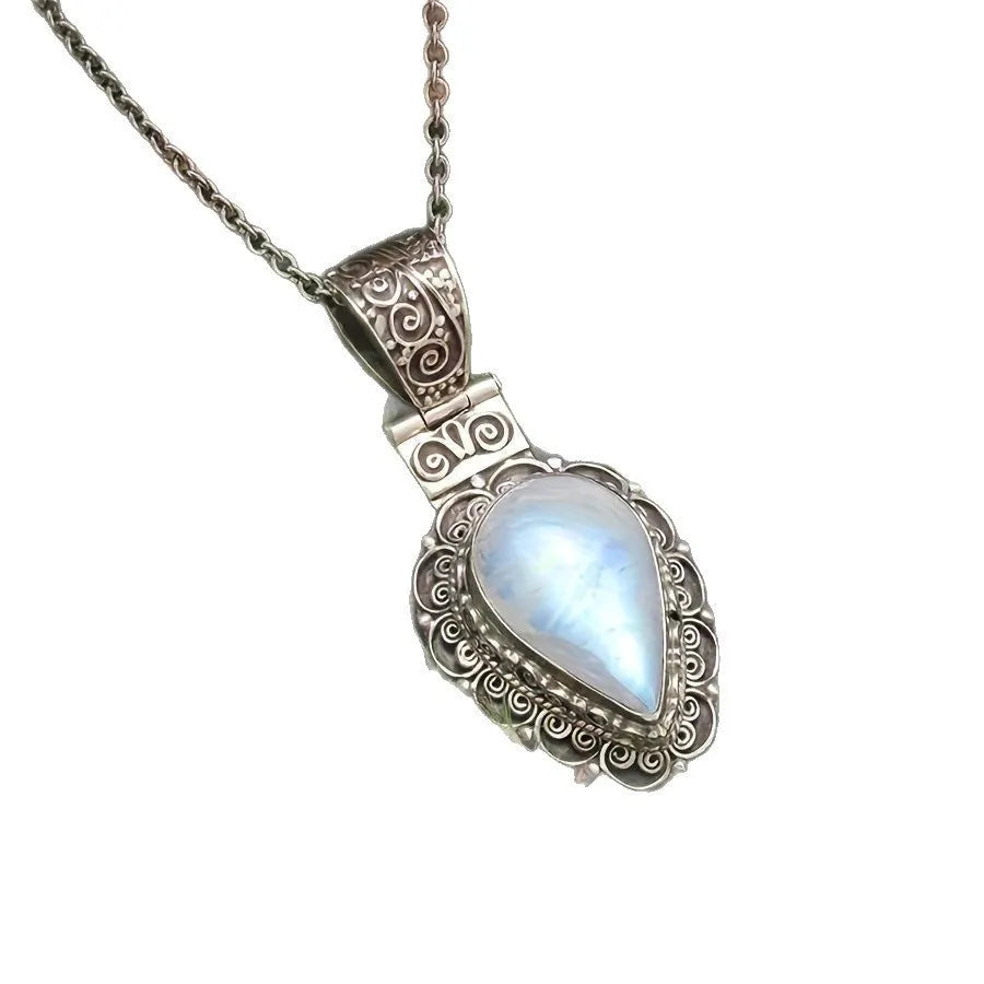 Silver heart-shaped vintage moonstone drop necklace on alloy chain