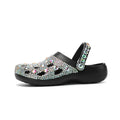 Black women's platform sandals with rhinestone detailing and perforated EVA upper