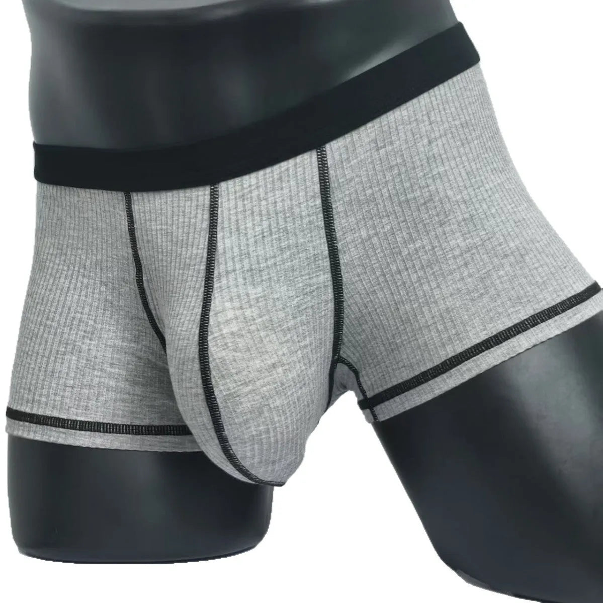 Men's slim-fit breathable boxer shorts in solid colours, shown in size range L to 3XL.
