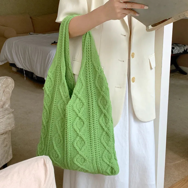 Retro hollow knitted polyester tote bag in a solid colour with double shoulder straps.
