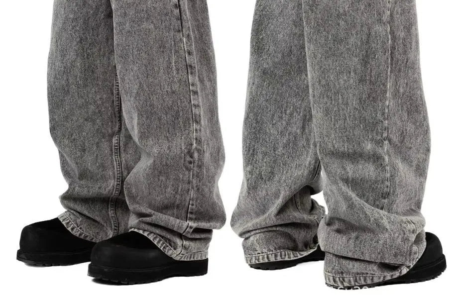 Grey loose straight-leg denim trousers for men and women on hanger