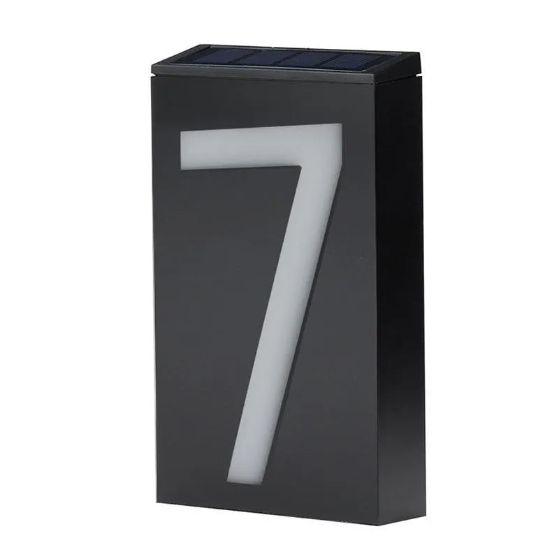 Solar powered house number light with LED illumination and waterproof housing for outdoor installation