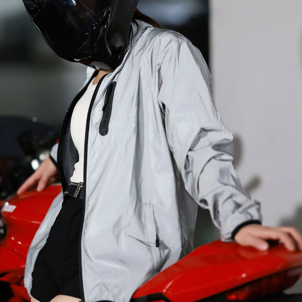 Waterproof polyester long sleeved windproof top in silver colour showing European sizing options