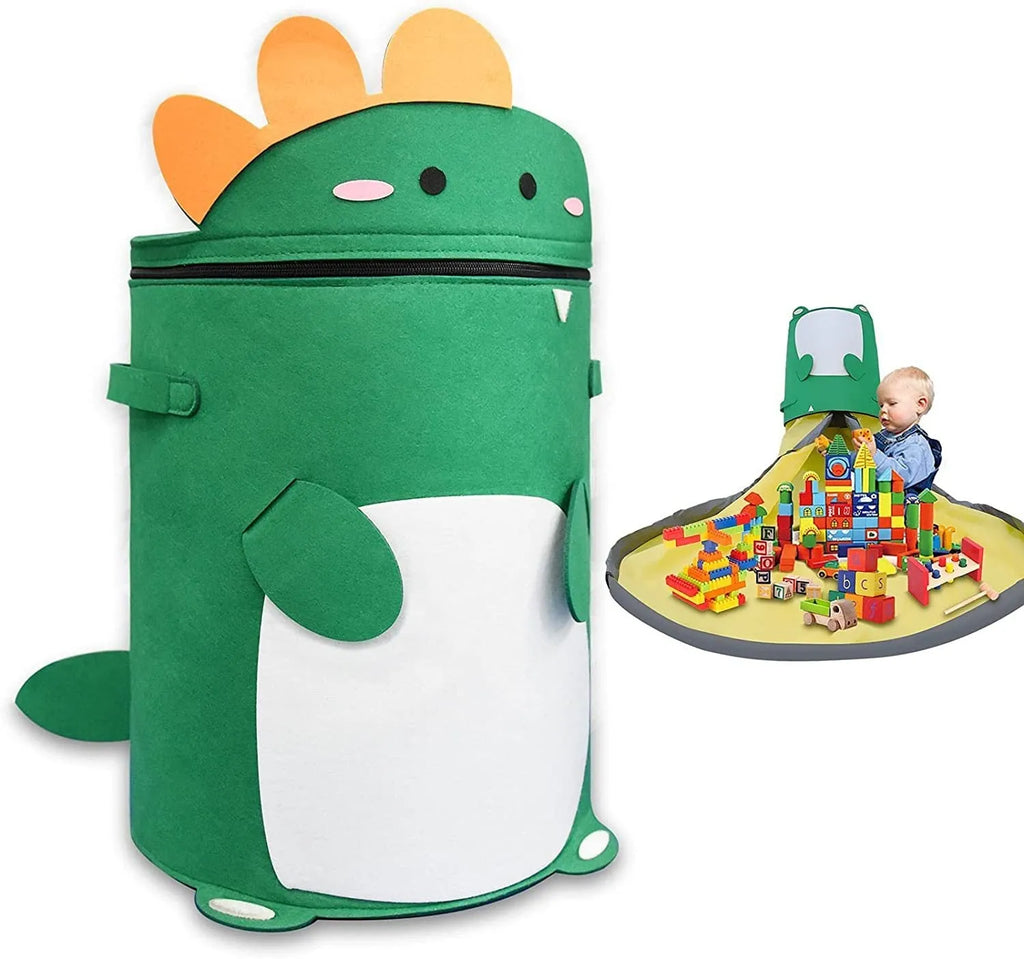 Green cube-shaped felt storage bag with pull rope lying flat as a play mat.