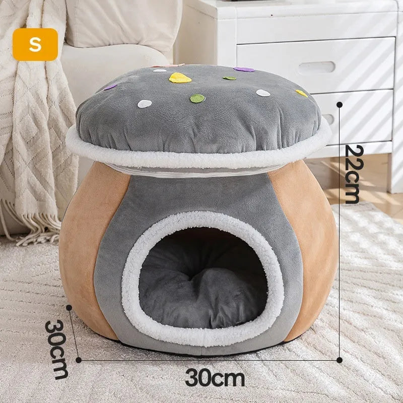 Purple mushroom-shaped plush cat bed for small pets on a grey background.
