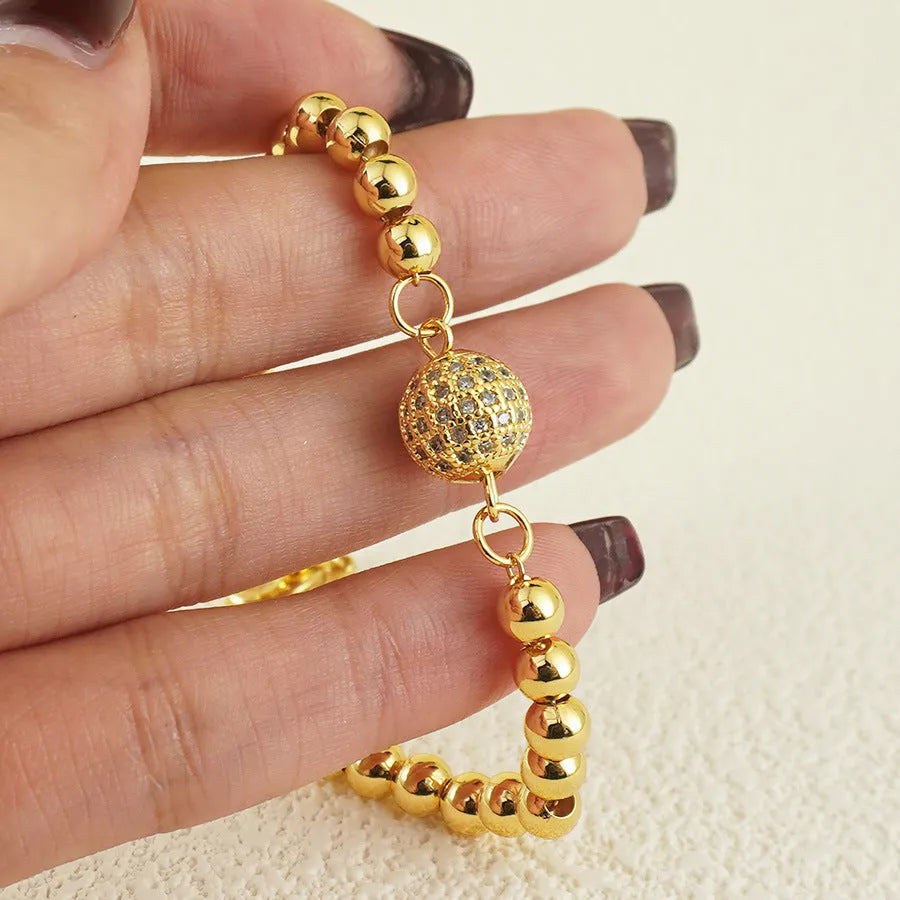 Copper bracelet with zircon stones in Arabic style design featuring heart shape details