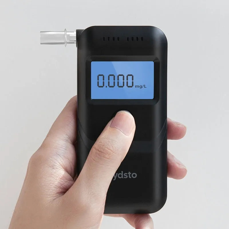 Black HD-JJCSY01 portable personal alcohol breath tester on a plain background.