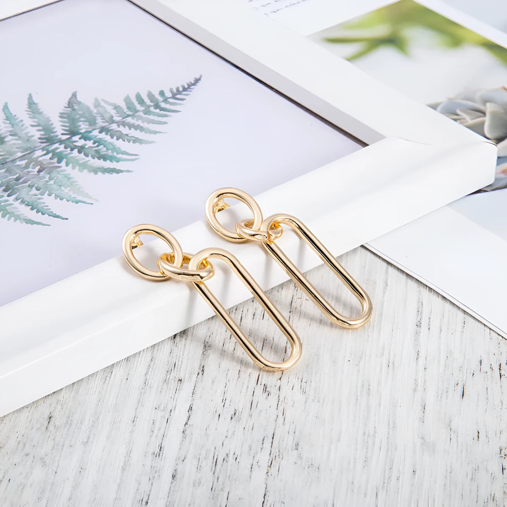 Sterling silver geometric hoop earrings for women with ring and line design elements