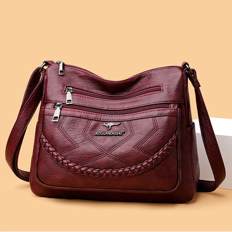 Soft PU leather shoulder bag in horizontal square shape with large capacity and zippered compartments