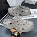 Men's sand-coloured EVA slippers with a thick sole and toe holder design on a plain background.