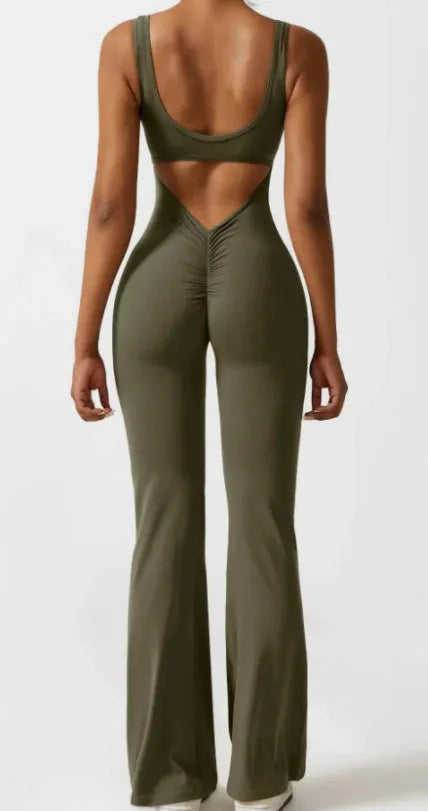 Women's black yoga bodysuit with hollow seam design and built-in chest pads