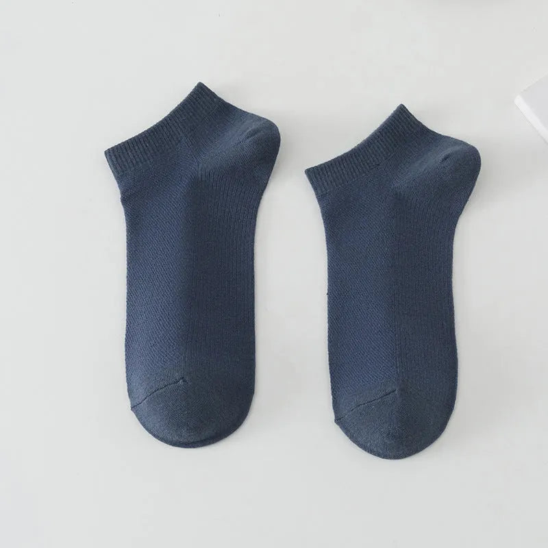 Men's solid colour polyester low-cut boat socks shown in one of six available colour options
