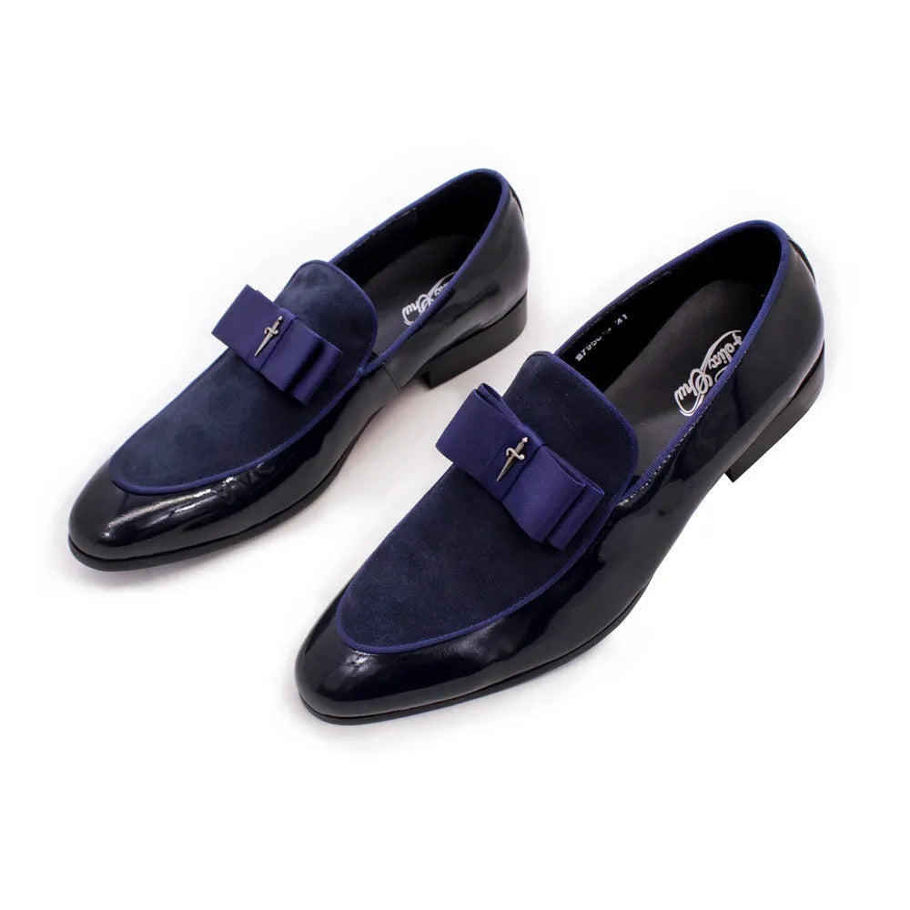 Men's black patent leather low-top dress shoes with a tassel detail on the front.