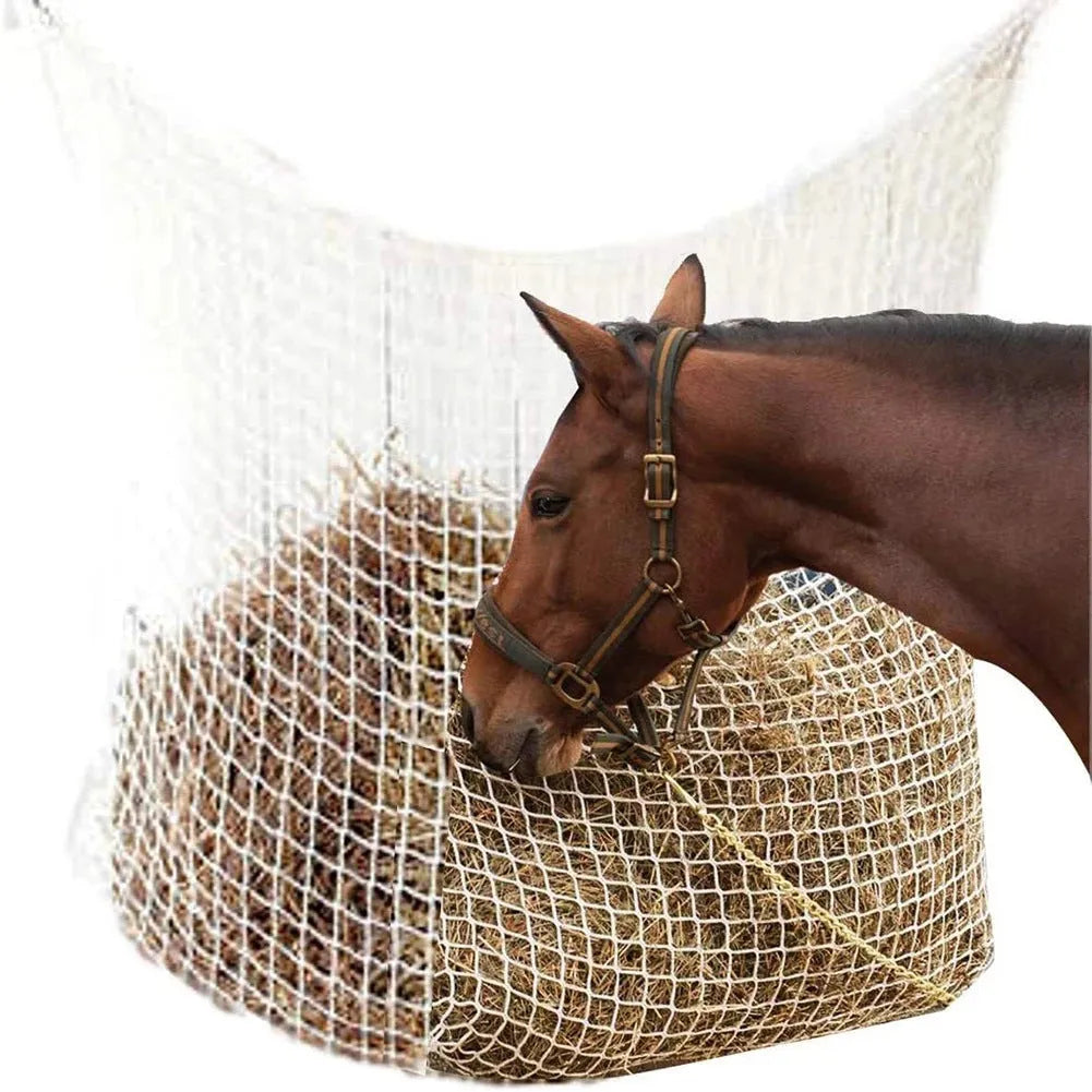 Woven grid horse feeding bag in black or white colours with hanging straps for livestock feeding