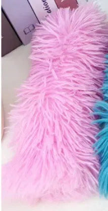 Soft plush cat toy pillow in blue, green, pink, or white, measuring 27 by 10 centimetres.