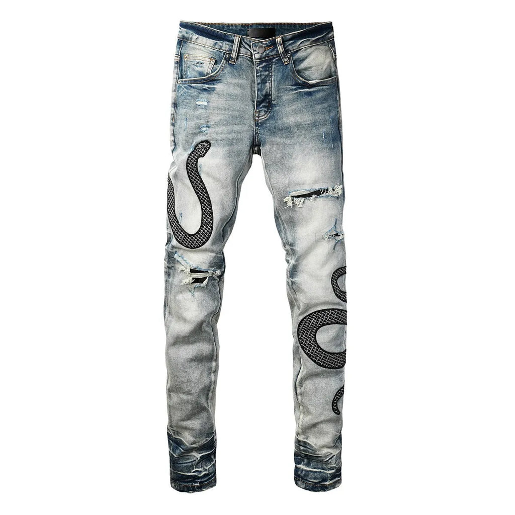 Men's blue distressed skinny jeans with a wash effect and button fly