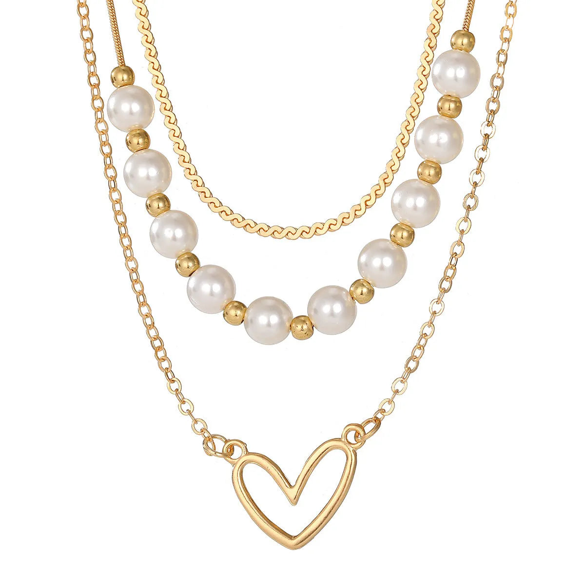 Vintage gold heart pearl necklace with adjustable chain on white background
