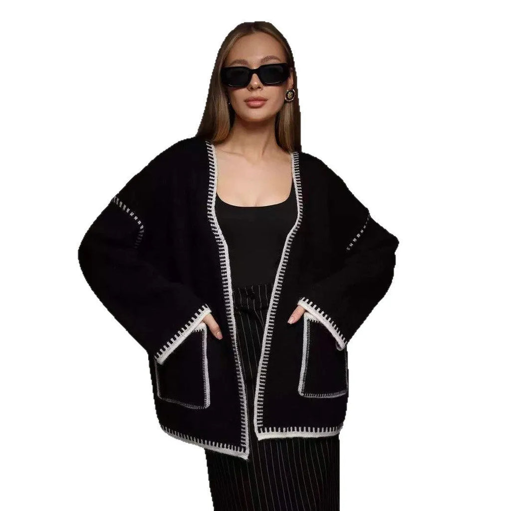 Lace-up front knitted cardigan in imitation cashmere fabric showing loose fitting design and long sleeves