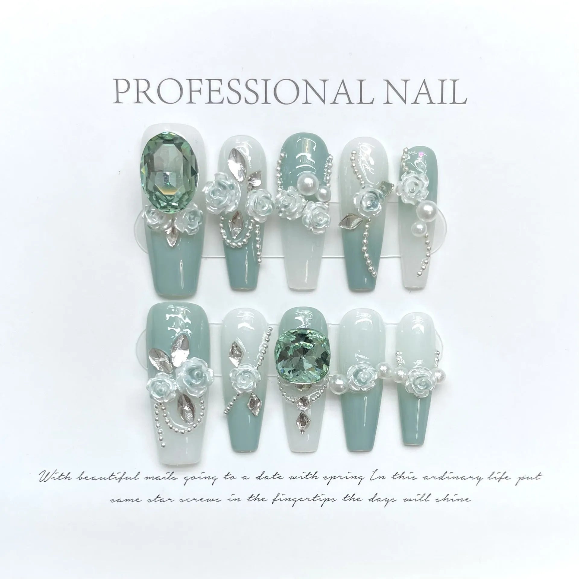 Green plastic nail armour suit with diamond accents and a gradient camellia chain decoration.
