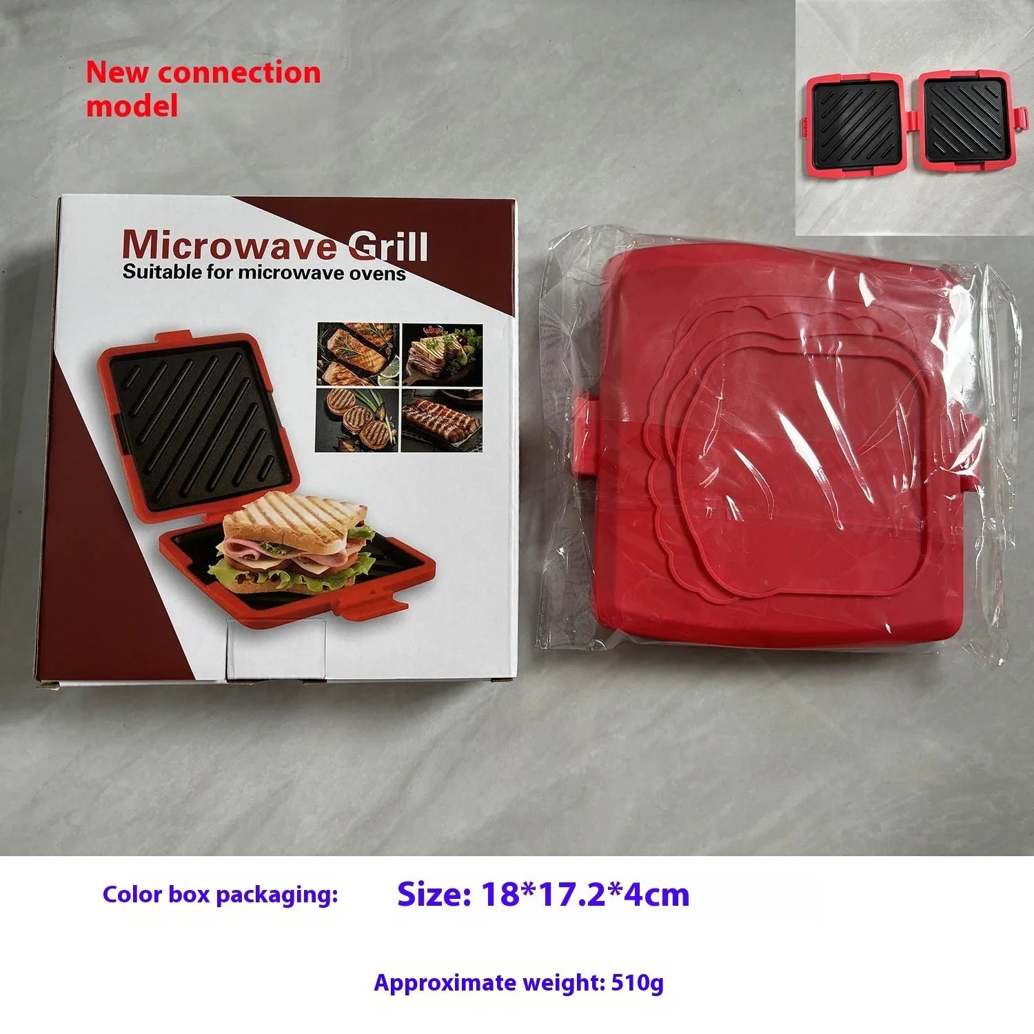 Red silicone baking tray with integrated handle and a pair of matching silicone oven gloves on a kitchen counter.