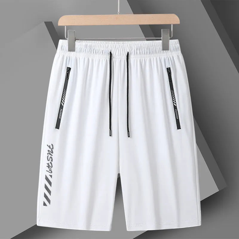 Men's black nylon quick-drying sports shorts with elastic waistband, shown in loose fit.