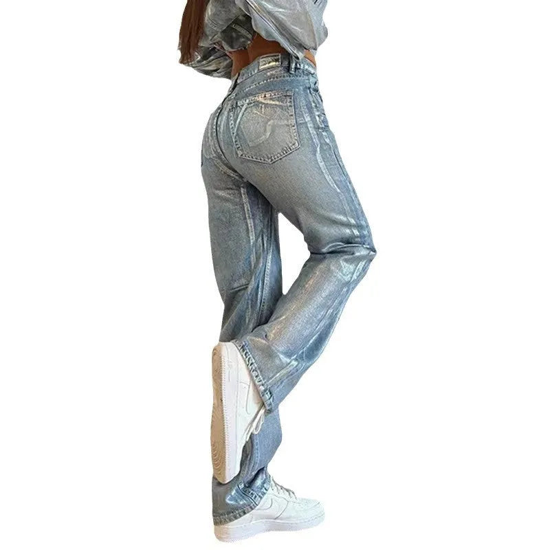 Women's washed blue high waist straight leg denim jeans with street hipster styling and contrast colour details